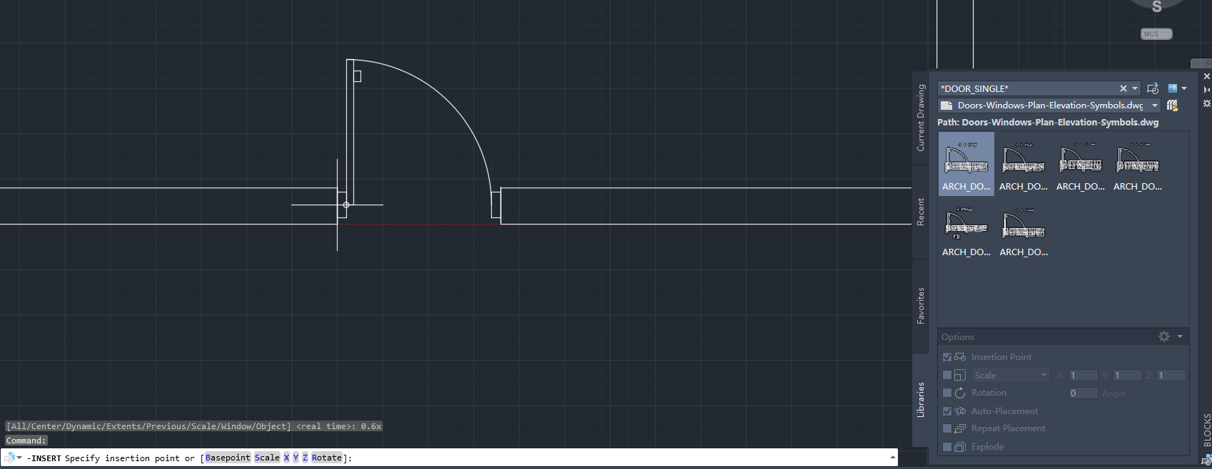 A 900 mm door block following the cursor in AutoCAD, its hinge at the left end of an opening in the wall and the leaf swinging into the room, with the Blocks palette on the right and the INSERT prompt on the command line